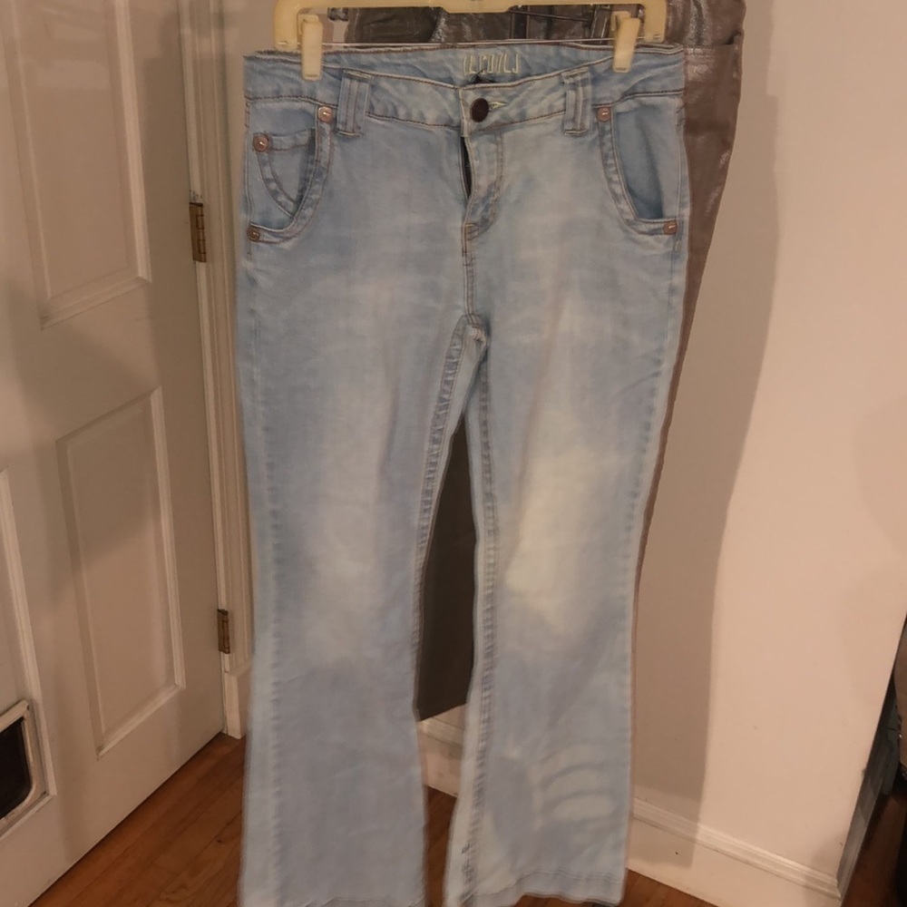 LL Cool J fits size 10-12 jeans flare wide leg light wash sized at 11